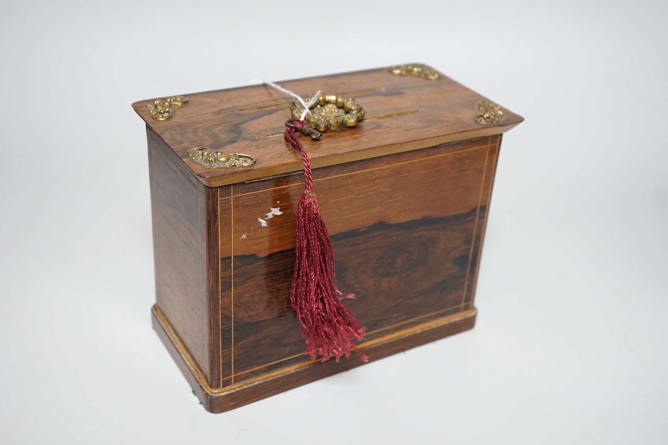 A late 19th century French rosewood letter box, with brass mounts, handle and key, 15.5cms high x 19.5cms wide